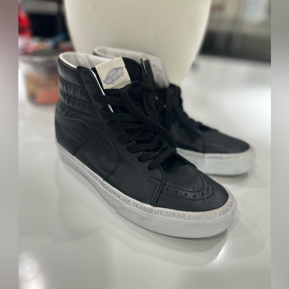 Vans black leather high tops women’s 7/ men’s 6